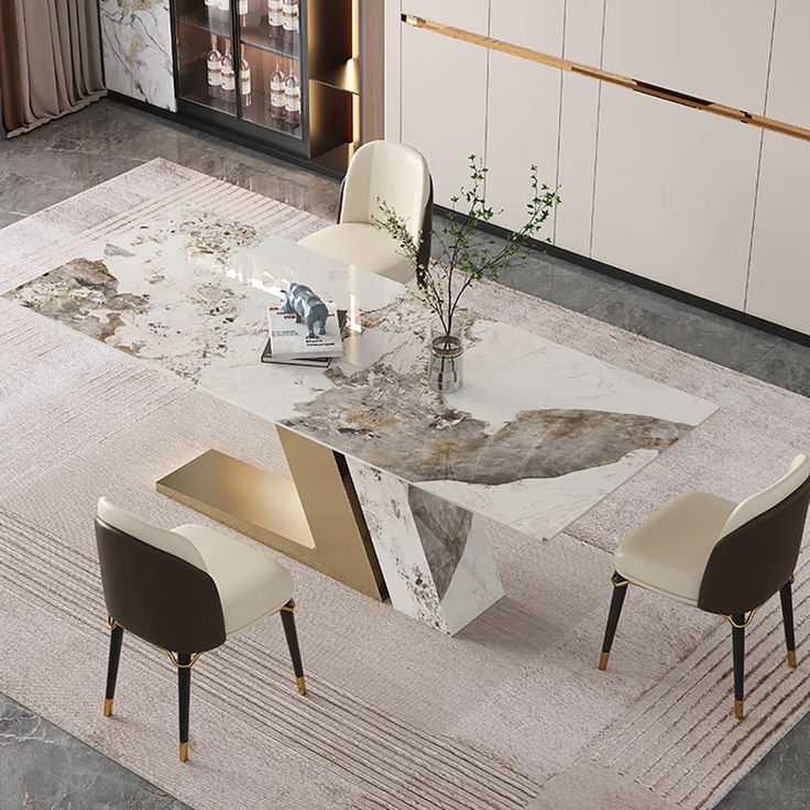 a marble dining table with chairs around it