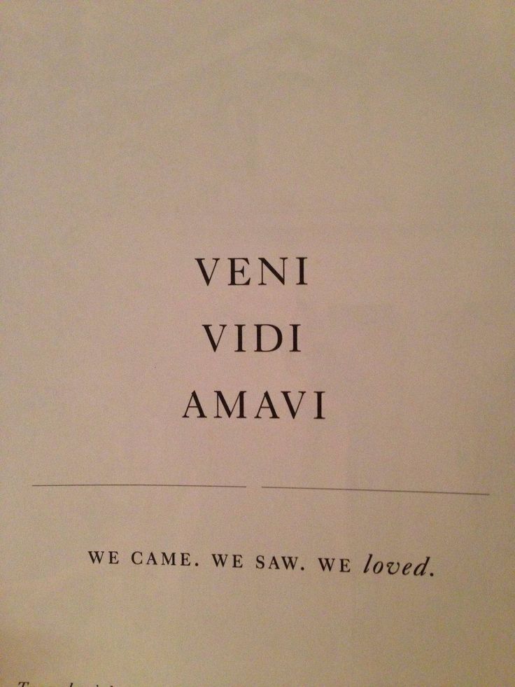 an old book with the words veni vidi amavi written in black ink