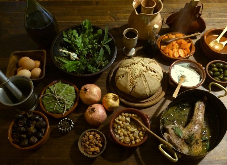 a table topped with bowls filled with different types of food