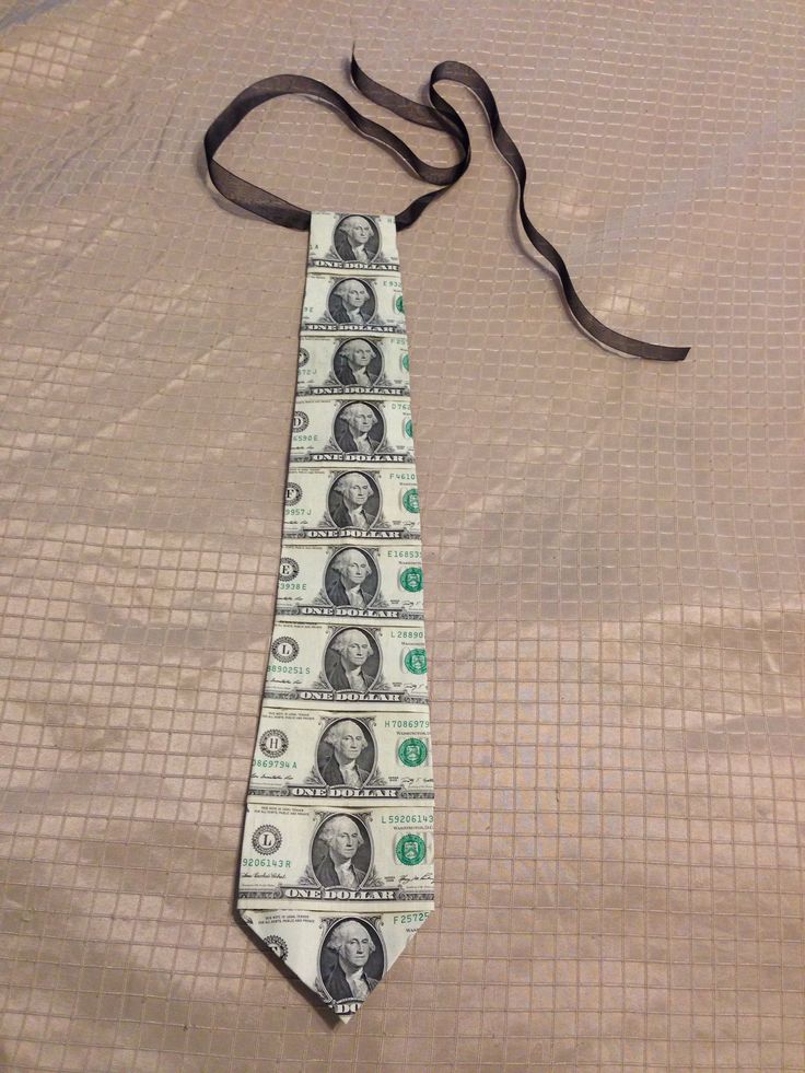 a tie that has money on it