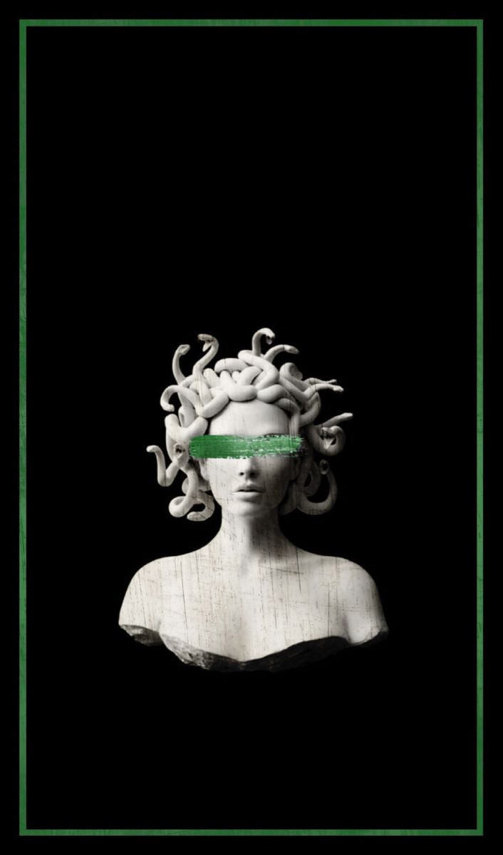 a white bust with green tape on it's head and tentacles in the hair