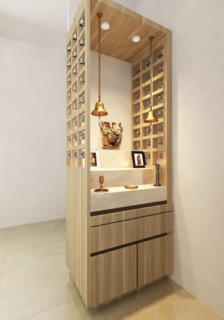 a bathroom with wooden cabinets and lights on the ceiling, along with an open shelf