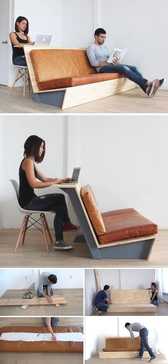 a woman sitting on top of a couch next to a man working on a laptop