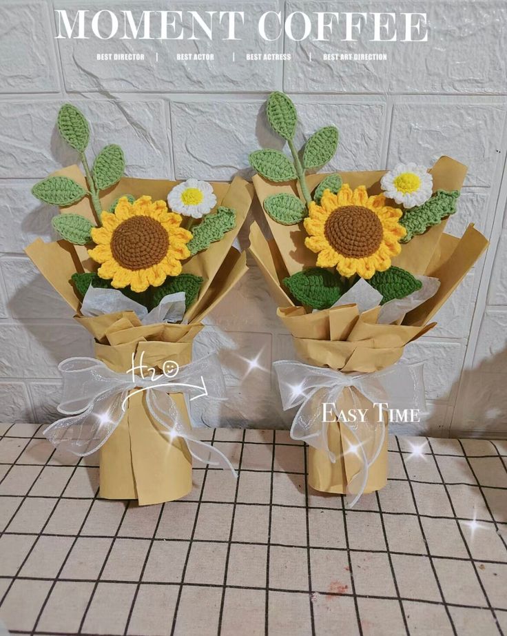 two vases filled with flowers sitting on top of a tiled floor next to each other