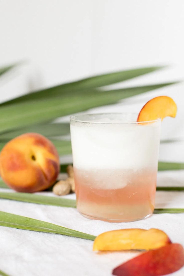 a peach and white drink sitting on top of a table