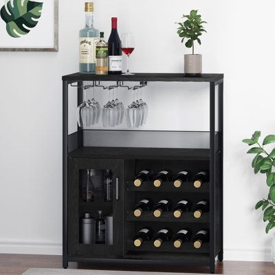 a wine rack with bottles and glasses on it