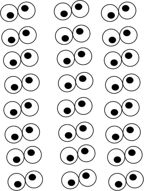 black and white circles are arranged in the shape of an eye, which is half circle