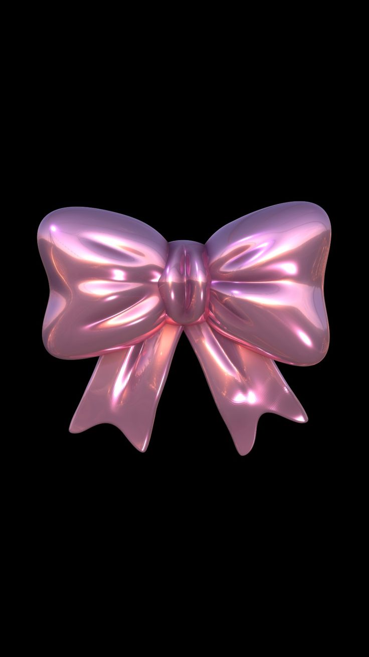 a shiny pink bow on a black background