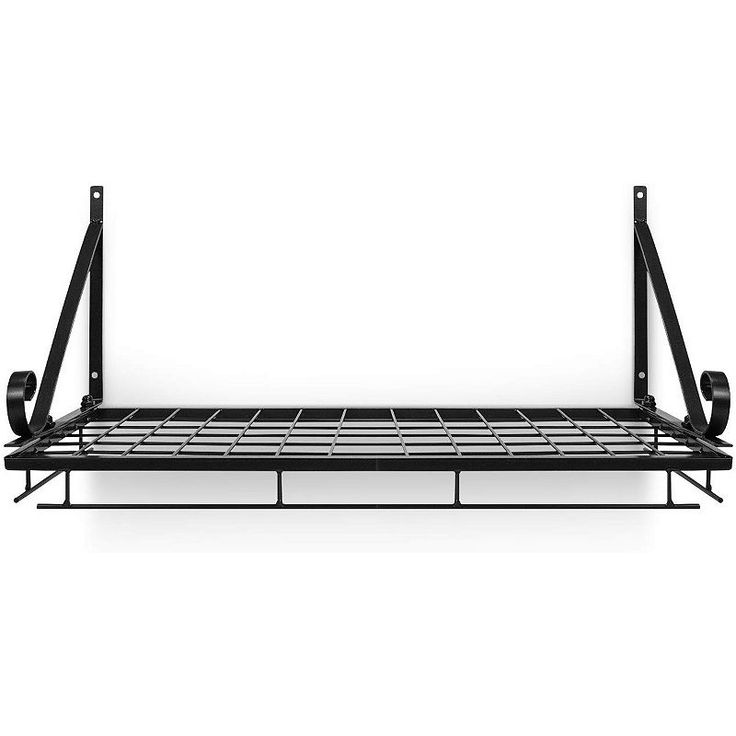 a metal bed frame with two black rails