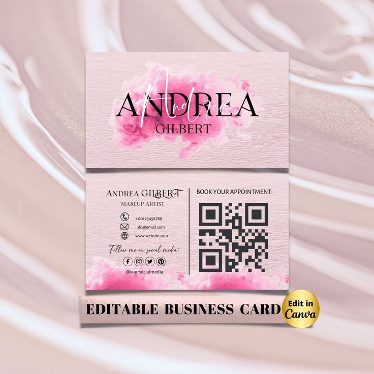 the business card is designed to look like it has been painted pink and white with flowers