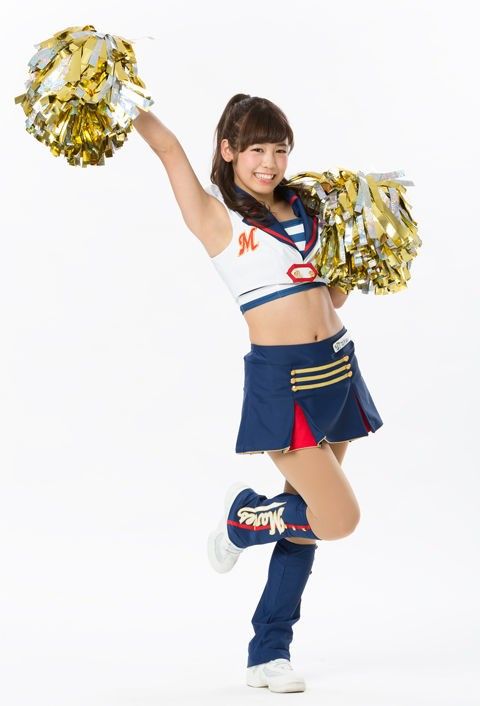 a woman in a cheerleader uniform is posing for the camera