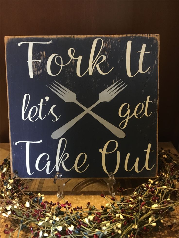 a sign that says fork it let's get take out with forks and spoons