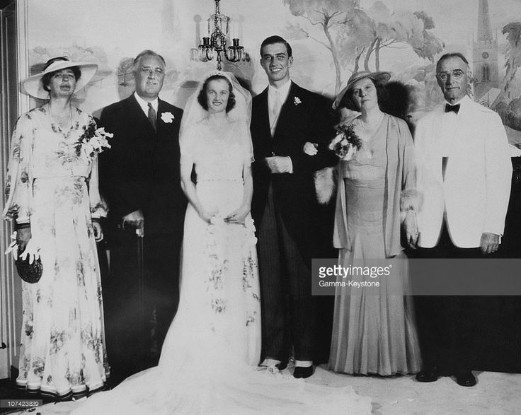 an old black and white photo of a wedding party