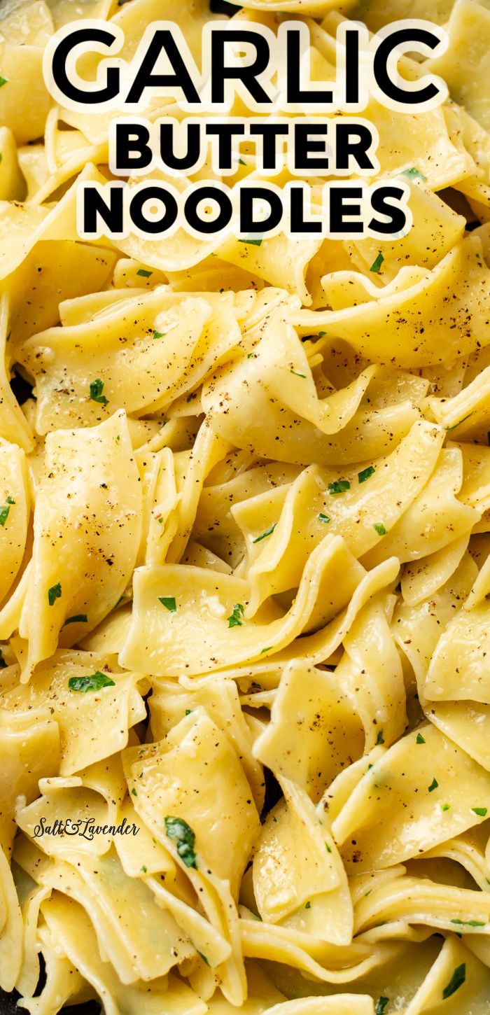 garlic butter noodles with parsley on top in a black skillet text reads garlic butter noodles noodles