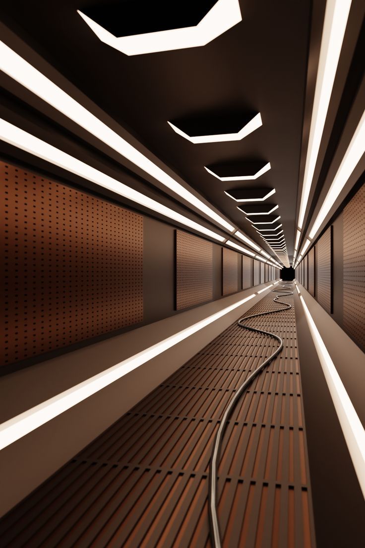 an abstract photo of a tunnel with lights coming from the ceiling and some wires running through it