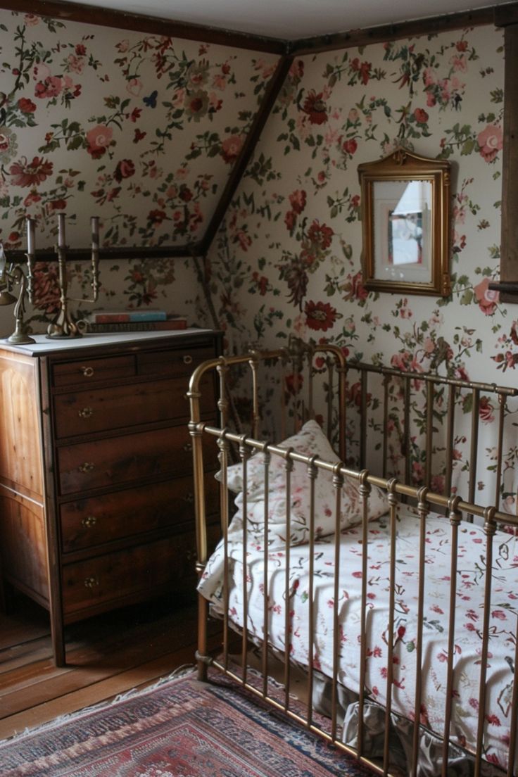 a bedroom with floral wallpaper and an antique dresser in the corner next to it