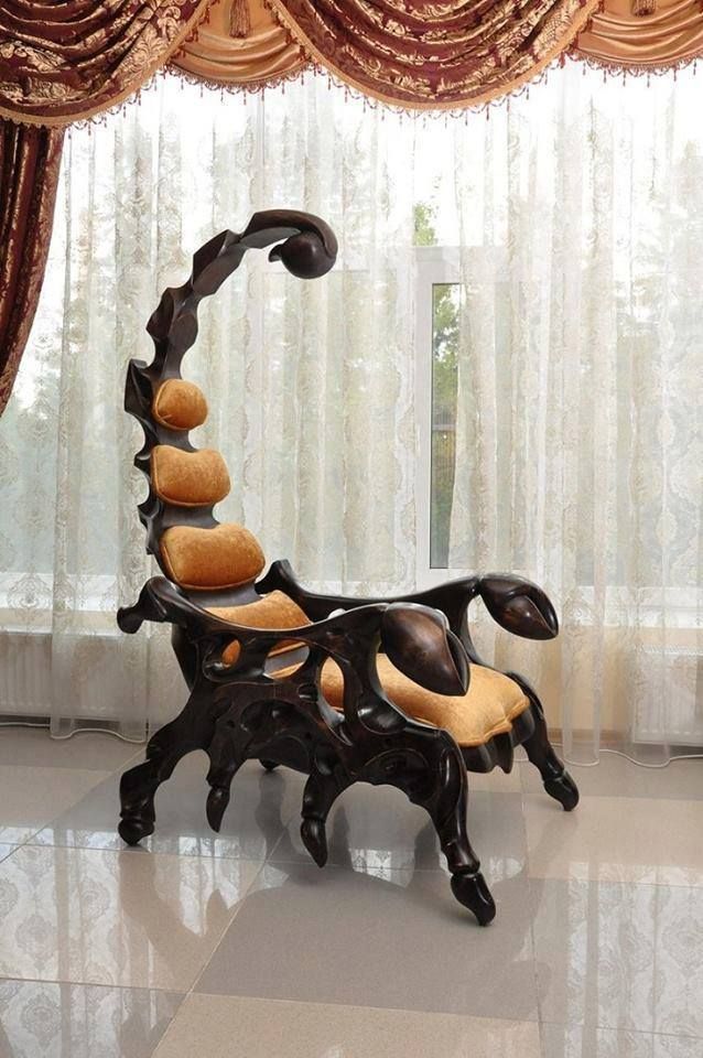 a chair that is sitting in front of a window