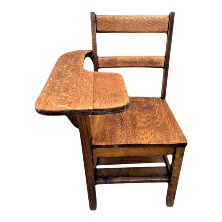 an old wooden chair with no seat and one side facing the camera on a white background