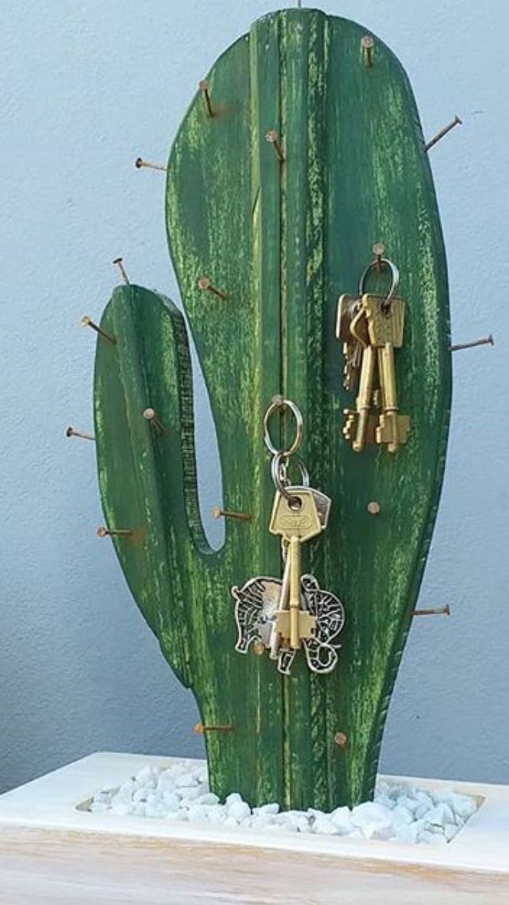 a cactus with two keys attached to it