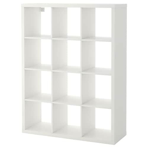 a white bookcase with six cubes on the front and four shelves below it