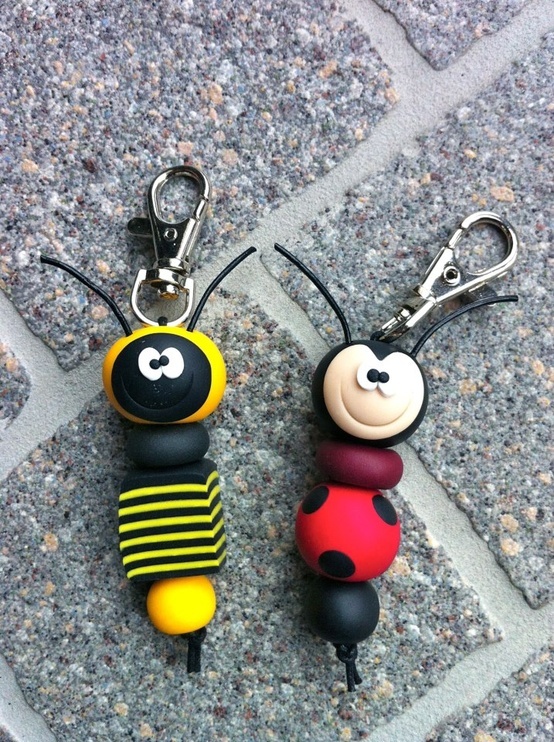 two keychains made to look like bugs