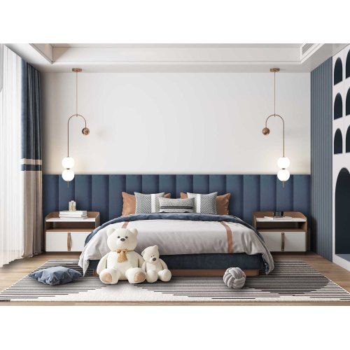 a bedroom with a bed, nightstands and two teddy bears on the rug in front of it