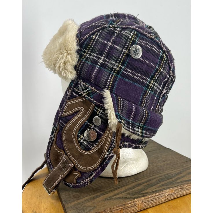 True Religion, Vintage Plaid Hat Amazing Piece From The 2000s - Good Vintage Condition - Purple, Teal, Brown, And Cream With Silver Button Accents - Wool Blend For True Warmth - Faux Fur And Vegan Leather Trim - Ear Flaps And Chin Buckle - Prominent Logos Throughout - Multiple Snap Detail Slide Buckle Closure At Neck True Religion Logo On Buttons. One Size Listing As A Unisex Item Y2k, 2000s, Logomania, Horse Shoe, Plaid, Check, Logo Vintage, Vtg Vintage Hat, Plaid Hats, Vintage Plaid, True Religion, Vintage Logo, Hats Vintage, Wool Blend, Aesthetic Clothes, Vegan Leather