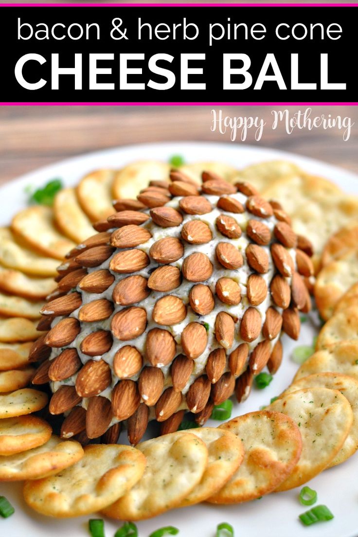 bacon and herb pine cone cheeseball on a plate with crackers