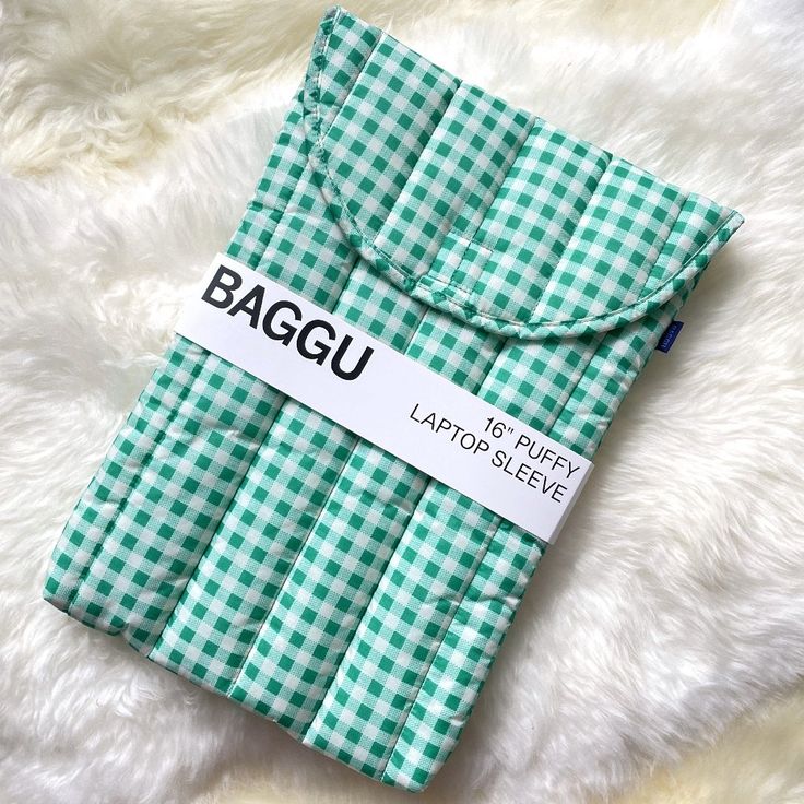 the bagu pouch is green and white checkered with black lettering on it's side