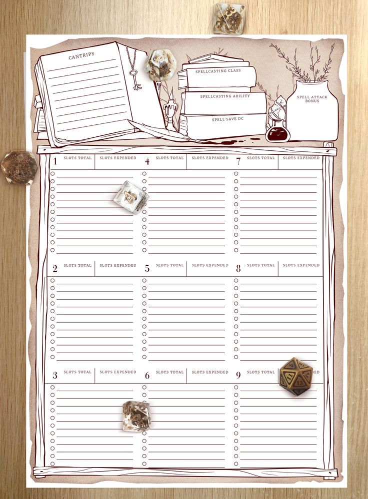 a printable planner is shown on top of a wooden table with other items in it