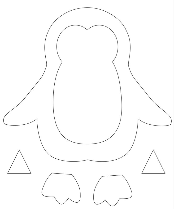 a penguin cut out from paper with triangles around it