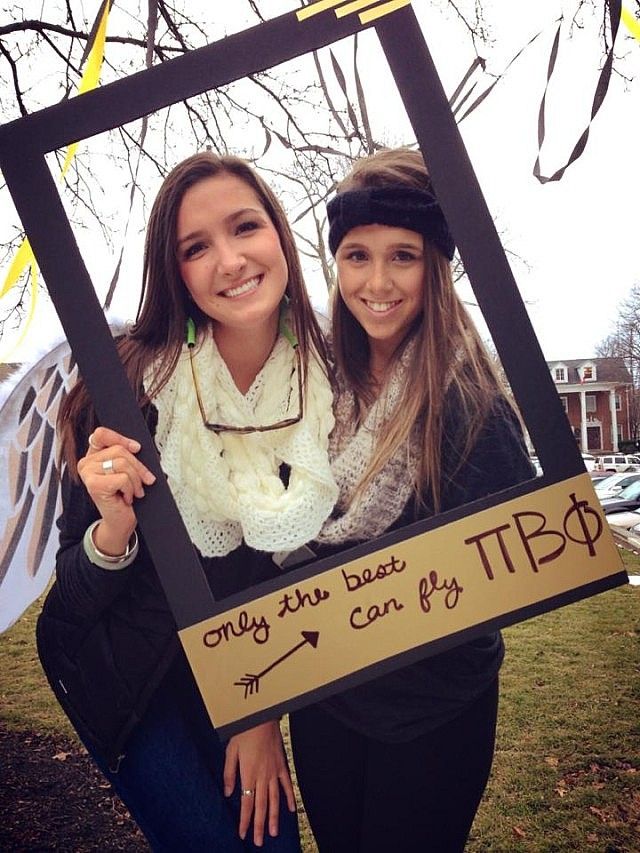 two girls are holding up a sign that says, may the best trip come to you