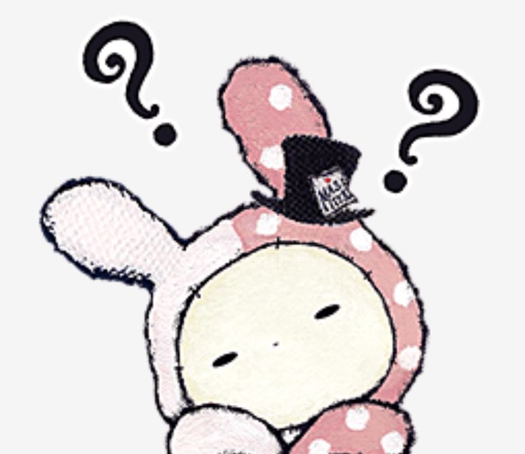 a pink and white stuffed animal with question marks on it's face, sitting in front of a white background