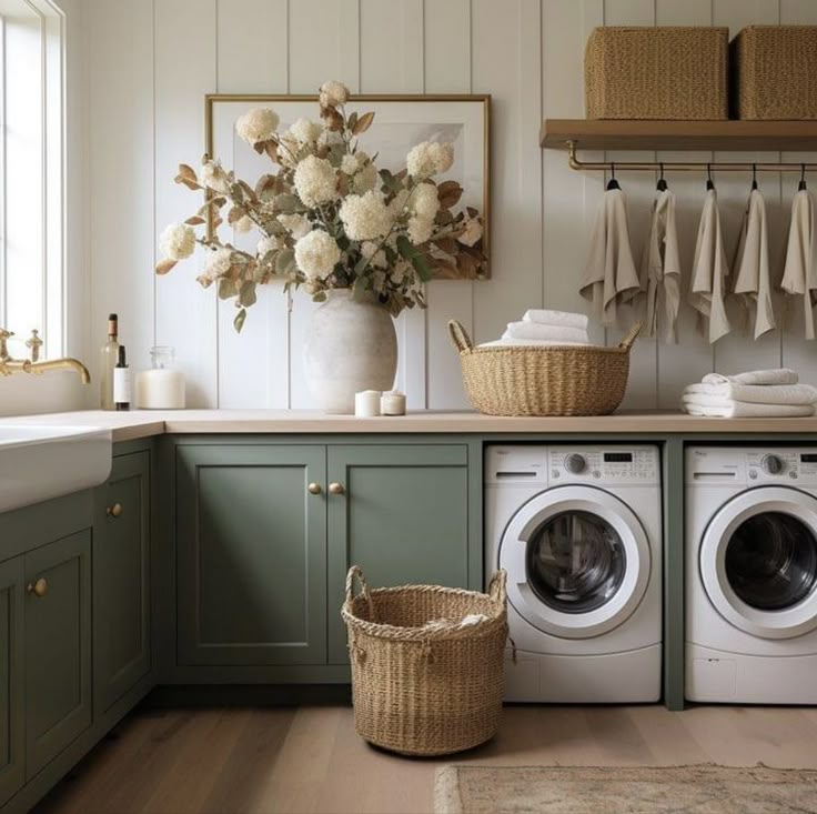 Laundry Room Wooden Cabinets, Blank Wall In Laundry Room, Laundry Room Design Sage Green, Boho Farmhouse Mudroom, Cottage Kitchen And Dining Room, Green And Cream Laundry Room, Meditteranean House Interior, Laundry Room Ideas Green Cabinets, Nordic Laundry Room