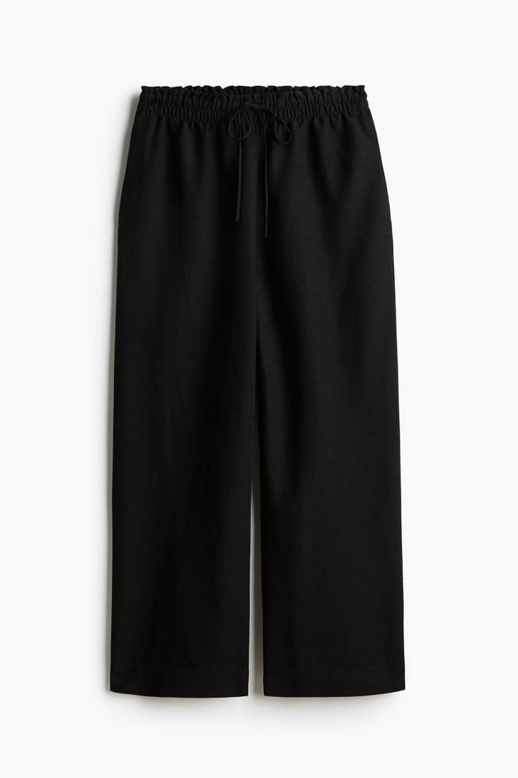 Loose-fit pants in an airy woven linen blend. High waist with ruffle trim  a narrow drawstring and smocked elastic at waistband  and discreet side pockets. Wide  ankle-length legs. Lookbook Casual, Black Linen Pants, Active Swimwear, Linen Blend Pants, Cardigan Sweater Dress, Blouse Pants, Cardigan Sweater Jacket, Kids Outerwear, Fit Pants