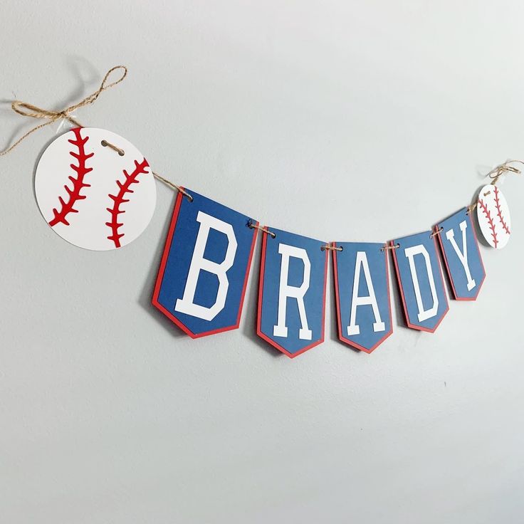 a baseball banner with the name brady hanging from it