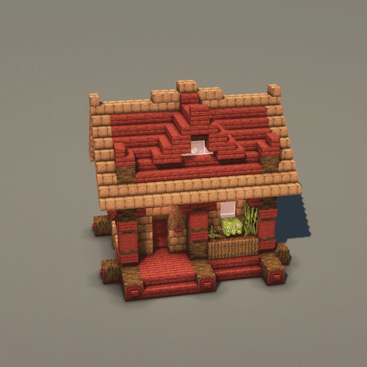 a small house made out of bricks with plants in the roof and on the ground