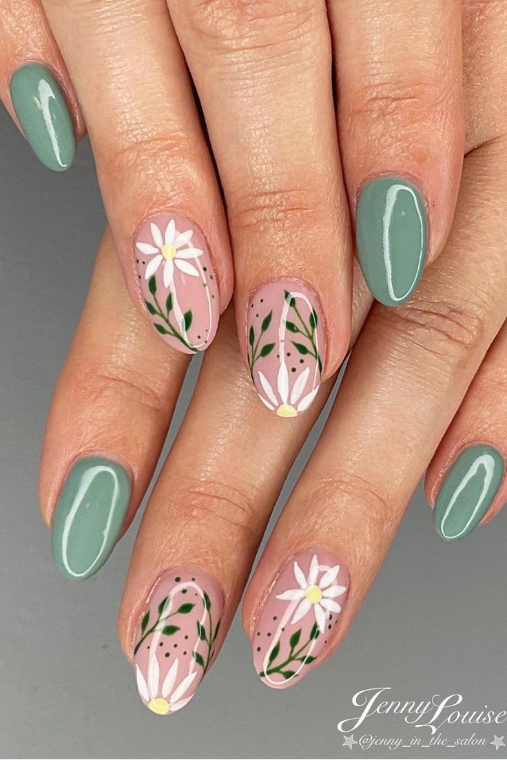 Embrace Spring's Blooming Beauty with Serene Sage Green and Pastel Pink Oval Nails. Click here to explore the delicate floral art adorning these fresh and feminine almond-shaped nails, complete with dainty white daisies and subtle green foliage. 🌸🍃 // Photo Credit: Instagram @pinkysnailsandbeauty Nail Design Gold, Sage Green Nails, Colorful Nails, Summery Nails, Purple Nail, Cute Gel Nails, Easter Nails, Pink Nail, Dipped Nails