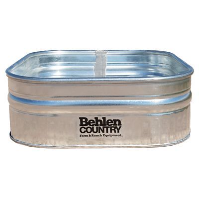 an empty metal container with the lid open on a white background for use as a food warmer