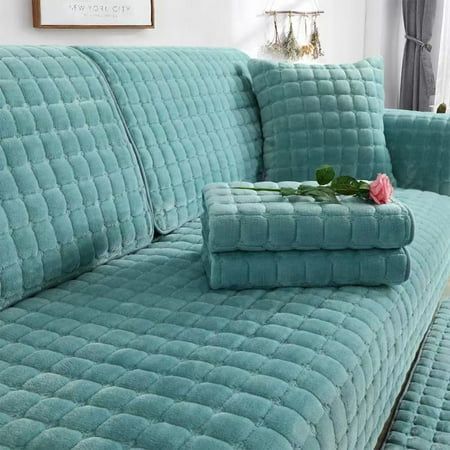 a couch with two matching pillows on it