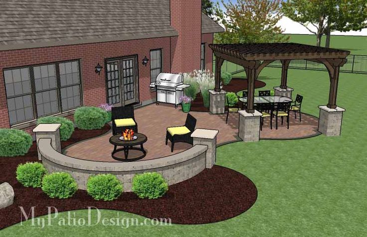 an outdoor patio with seating and fire pit