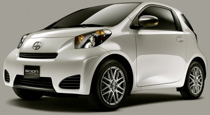 a white smart car on a white background