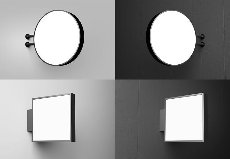 four different mirrors mounted to the side of a wall with one light on and another in front of it