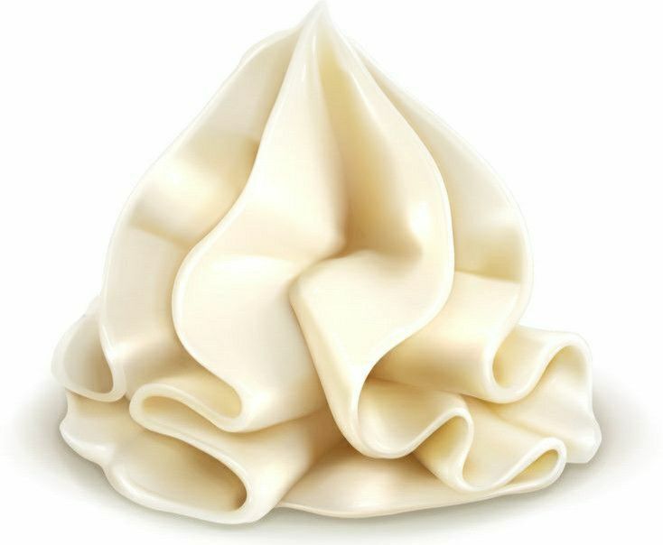 a pile of whipped cream on a white background