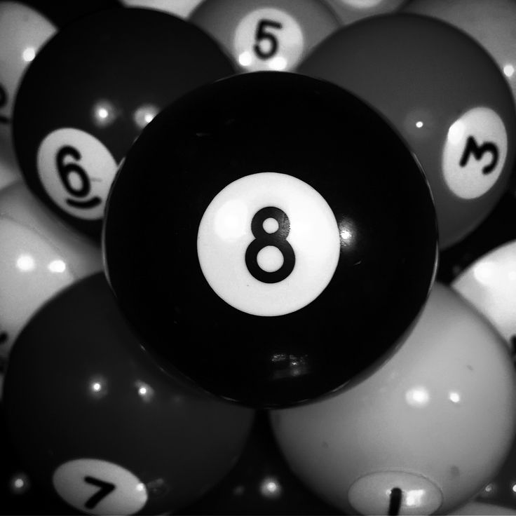 a pool ball with the number eight on it