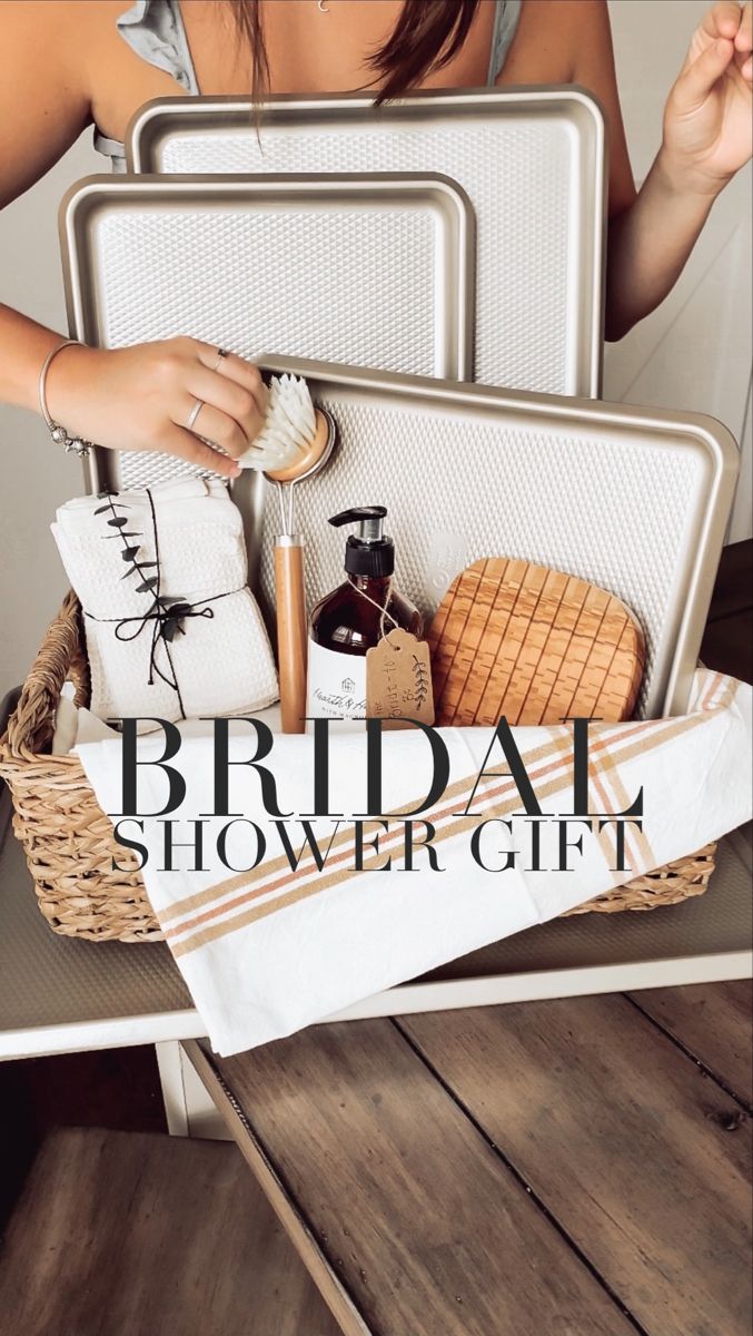 a woman is holding a basket full of personal care items and the words bridal shower gift