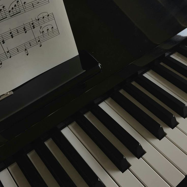 a piano with sheet music on it