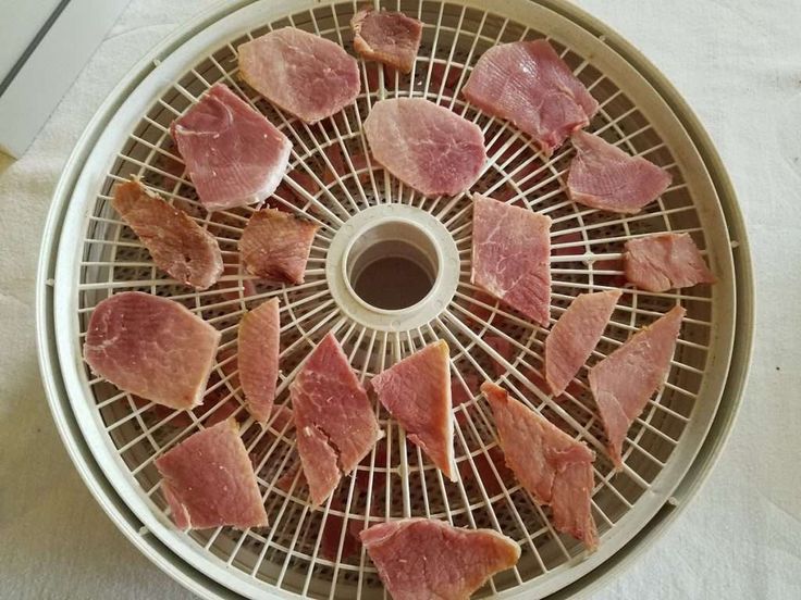 ham slices on a rack ready to be cooked