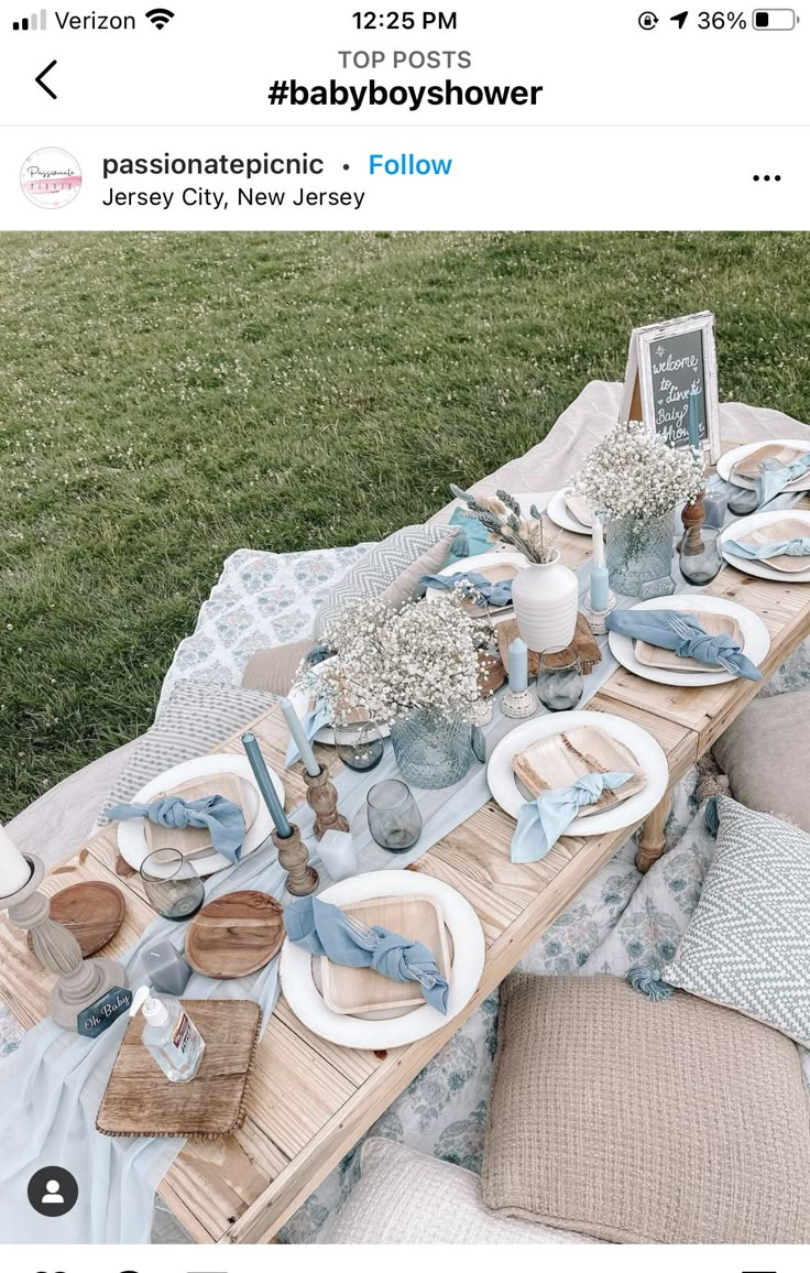 the table is set with blue and white dishes