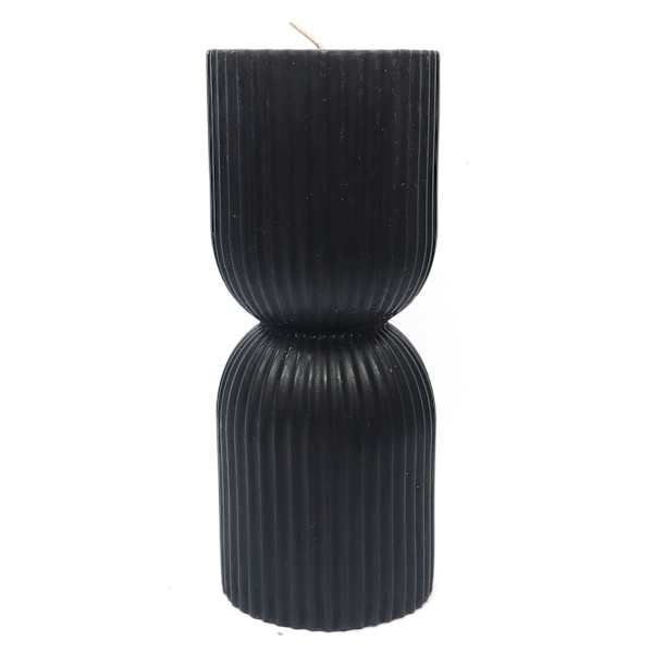 a tall black vase with a single candle in it's center on a white background